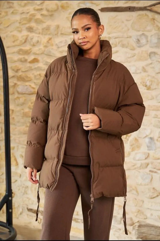 Mid-length quilted brown down jacket