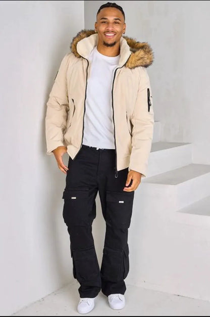 Beige hooded parka with fur trim