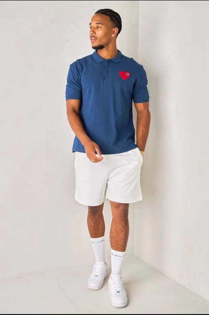 Navy blue polo with heart patch