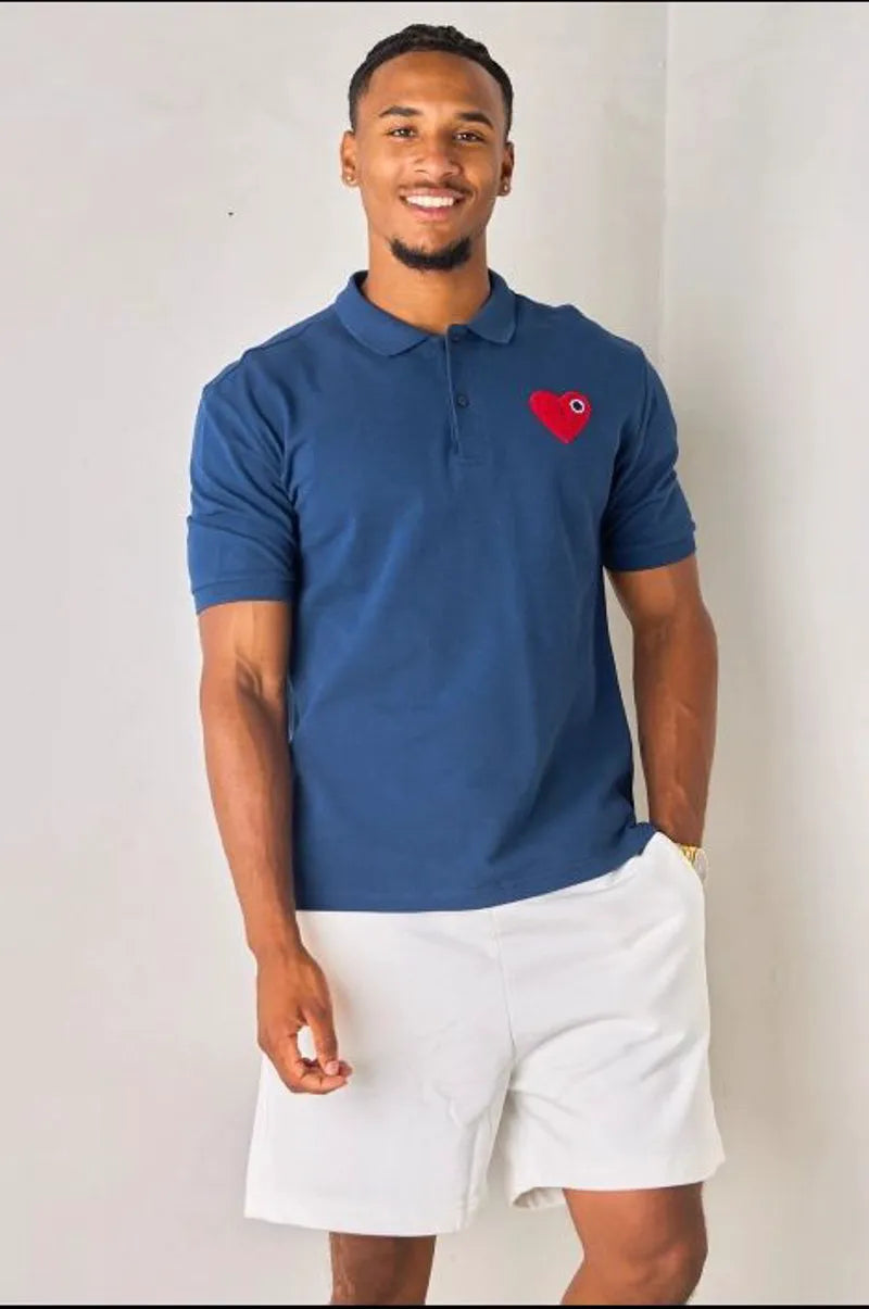 Navy blue polo with heart patch