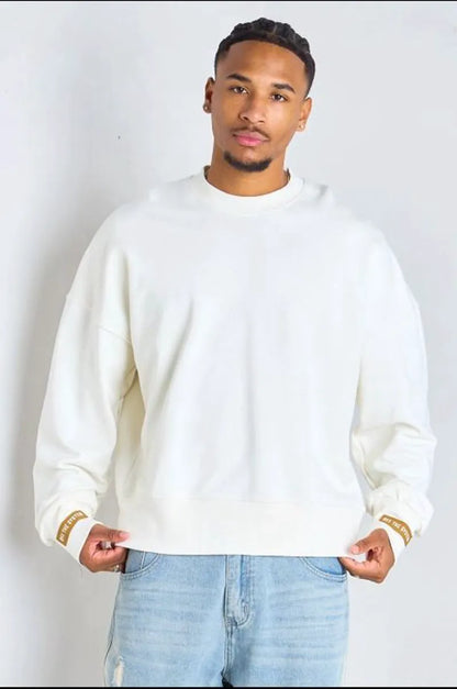 Embroidered white sweater "off the system"