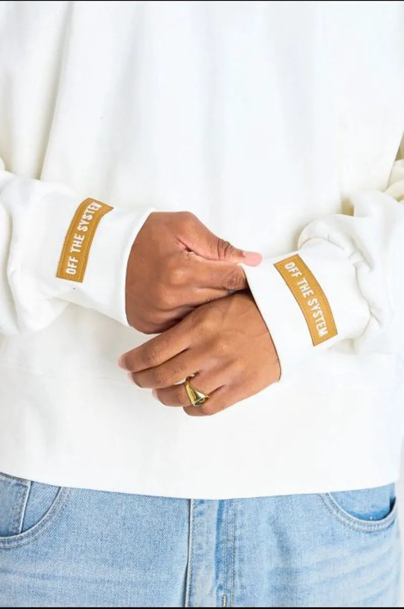 Embroidered white sweater "off the system"