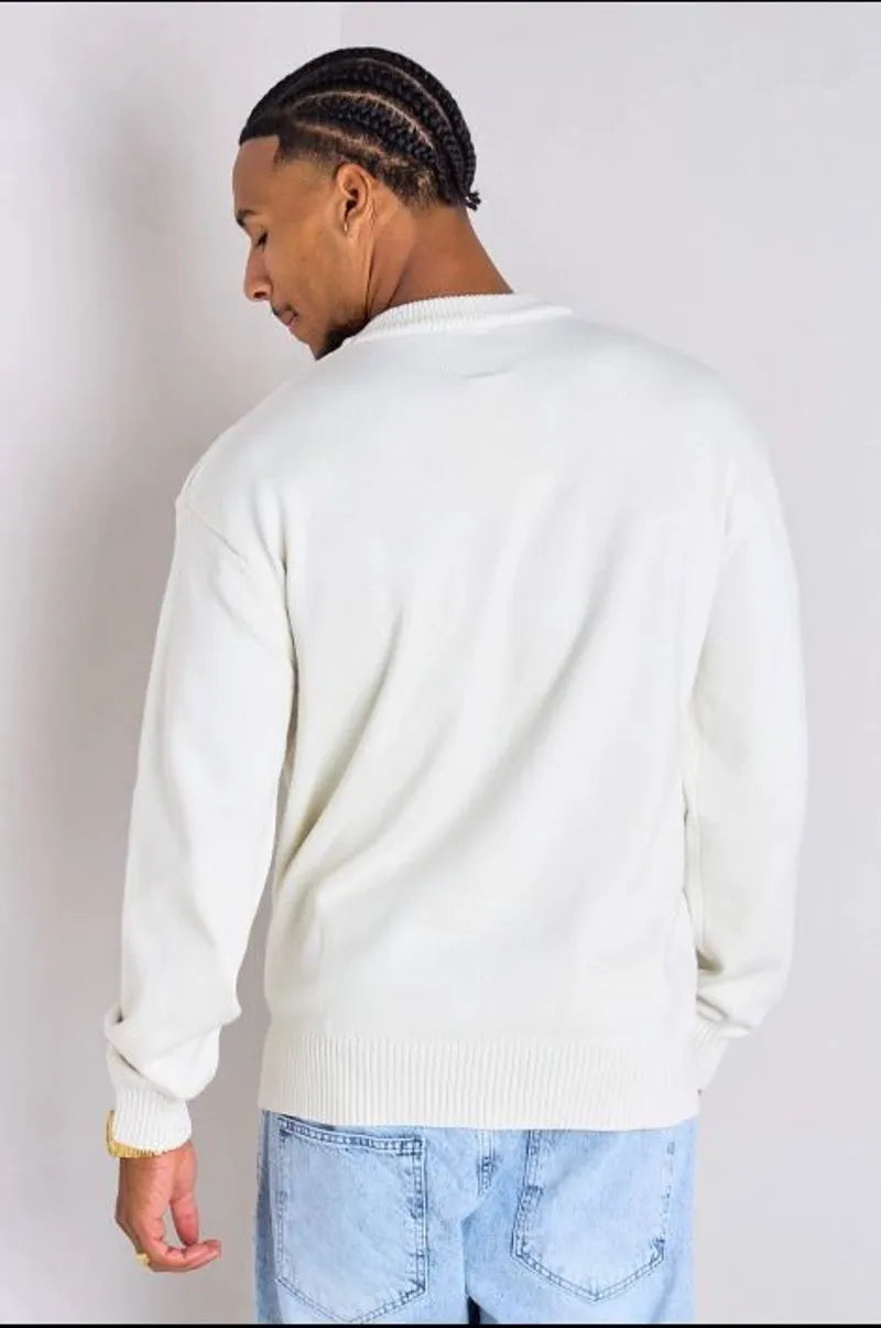 White knitted sweater with heart embroidery
