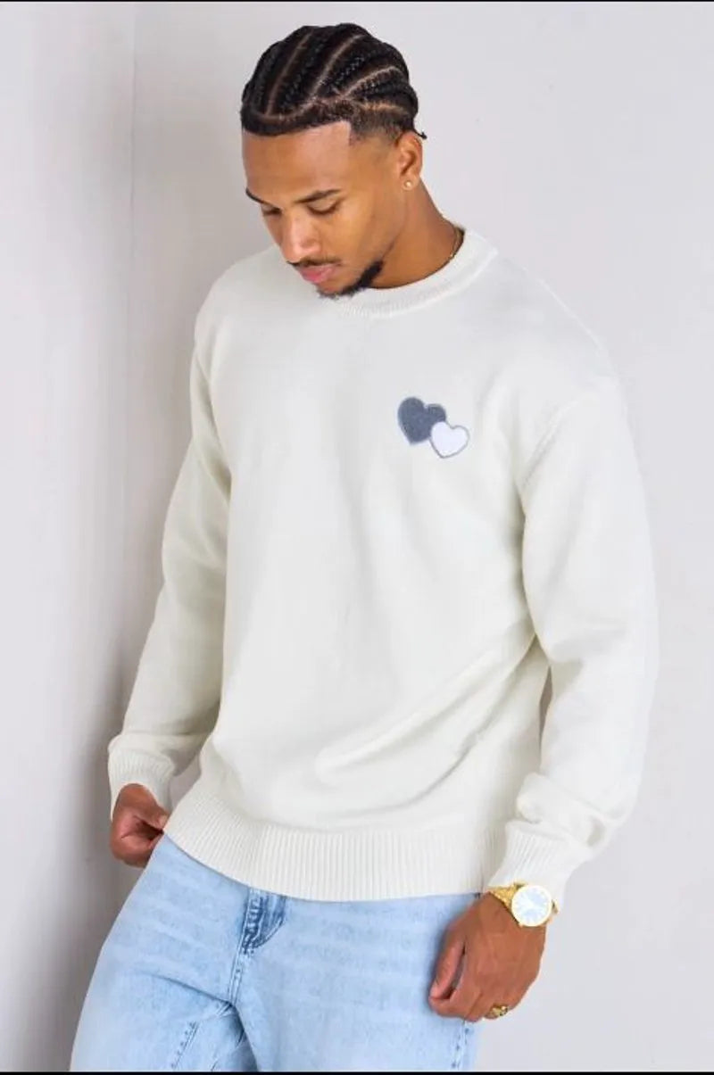 White knitted sweater with heart embroidery