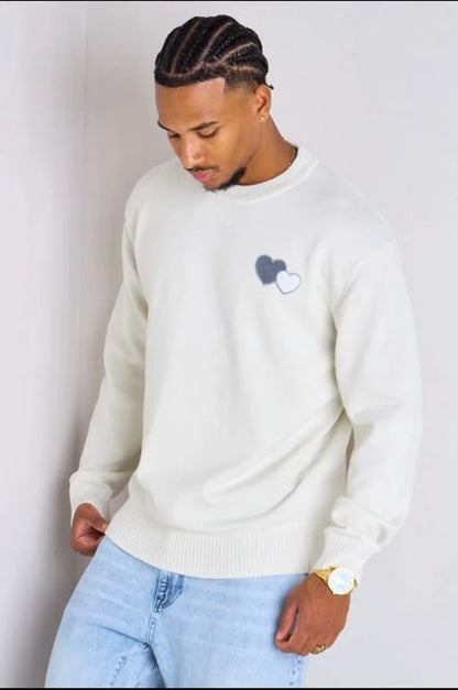 White knitted sweater with heart embroidery