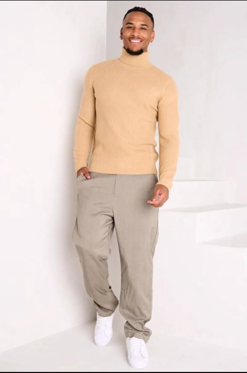 Camel-colored knitted turtleneck sweater