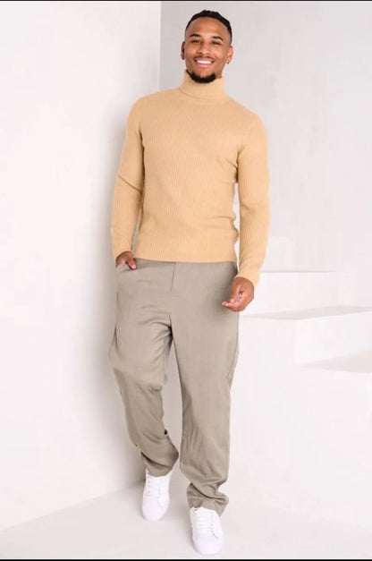 Camel-colored knitted turtleneck sweater