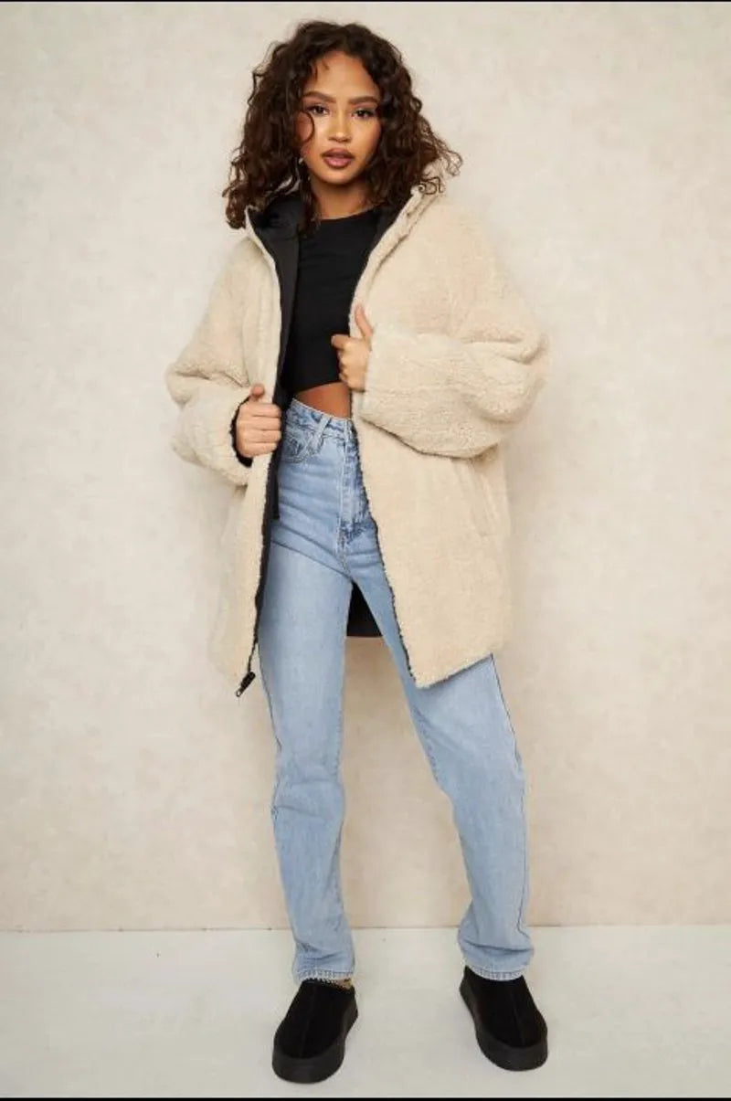 Reversible black down jacket with faux fur-lined hood
