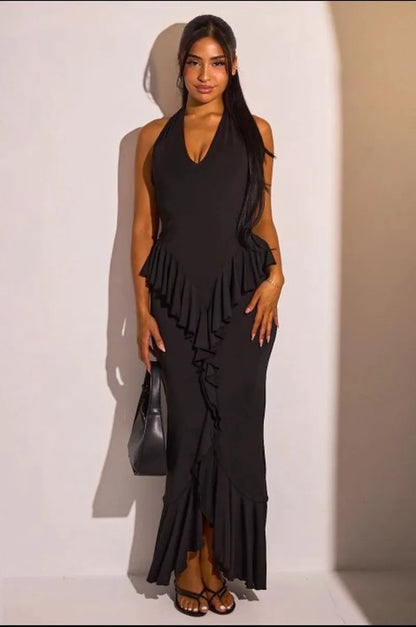 Robe dos nu noire cintrée à volants