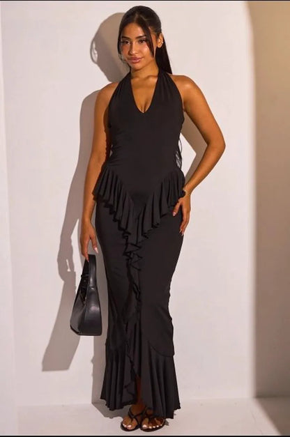 Robe dos nu noire cintrée à volants
