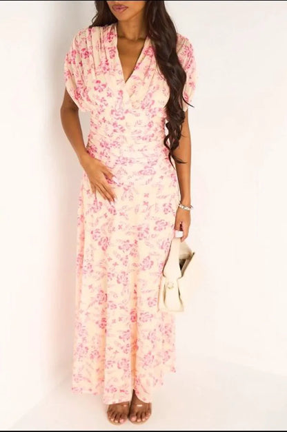 Robe jaune à motifs floraux rose et effet drapé
