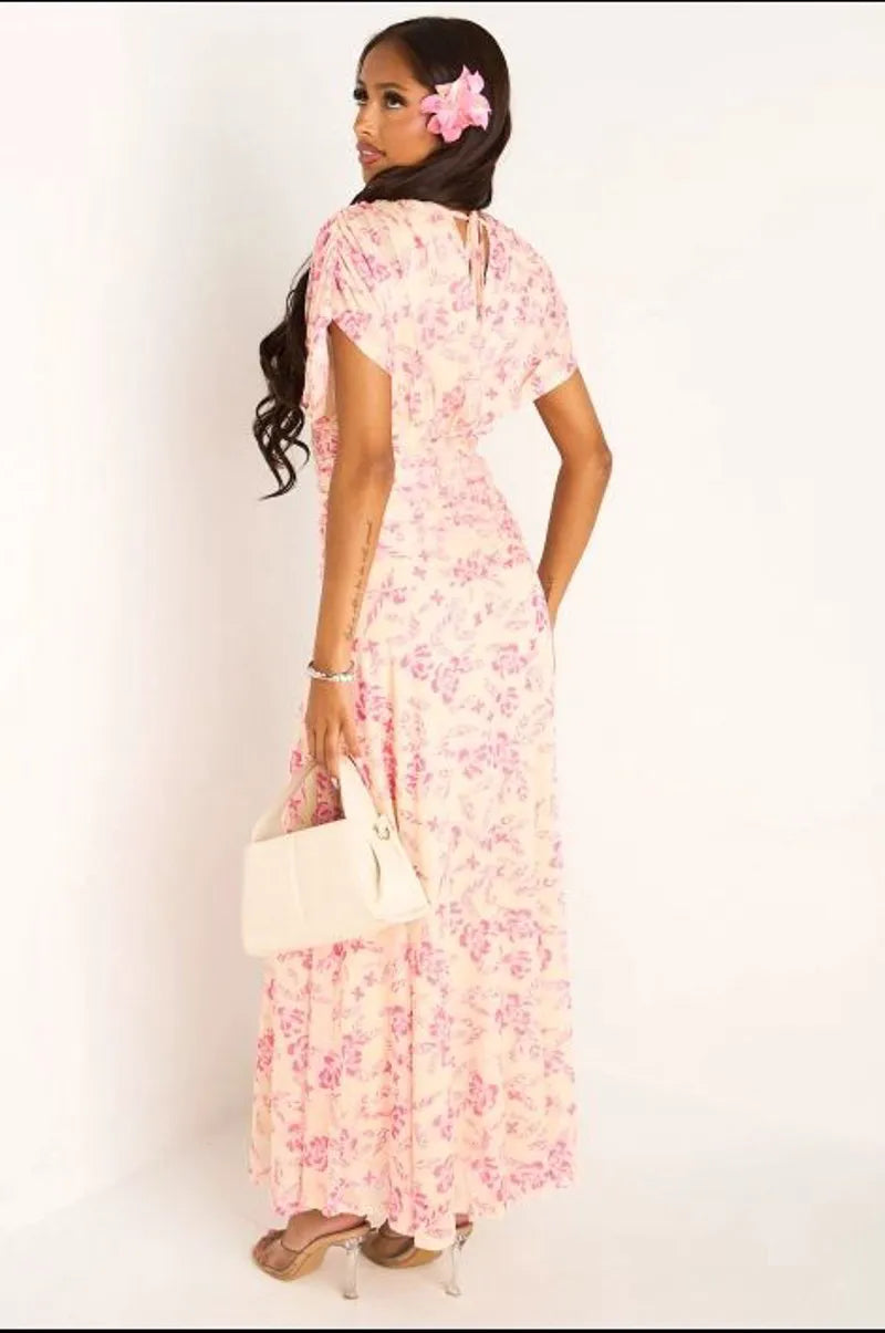 Robe jaune à motifs floraux rose et effet drapé