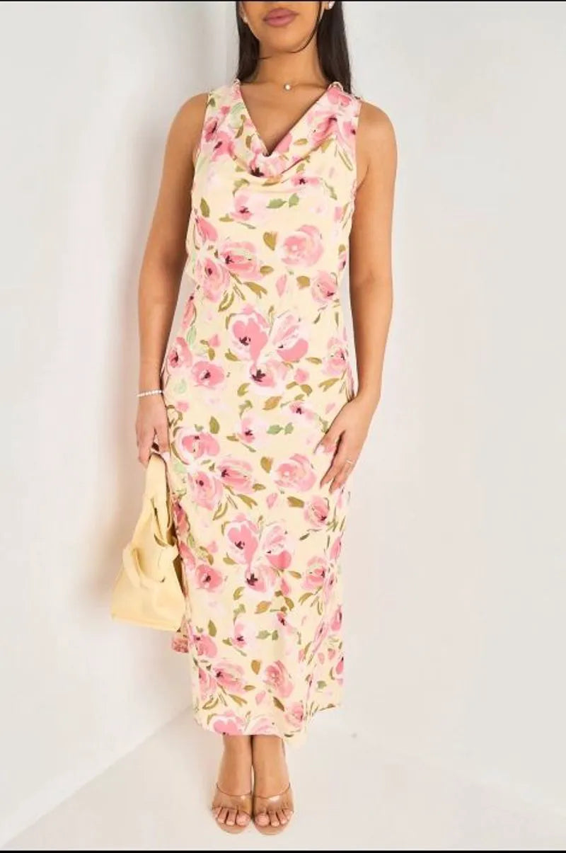 Robe longue jaune à col bénitier et motifs floraux