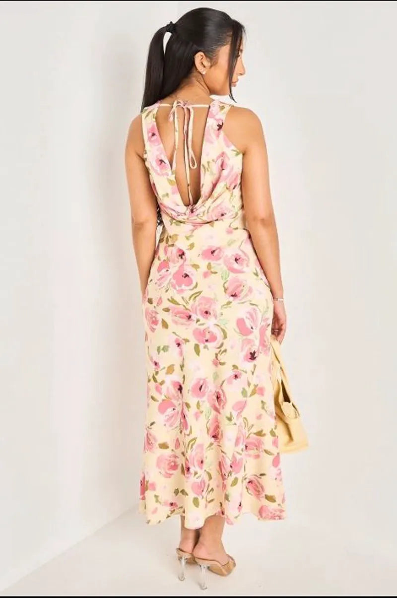 Robe longue jaune à col bénitier et motifs floraux