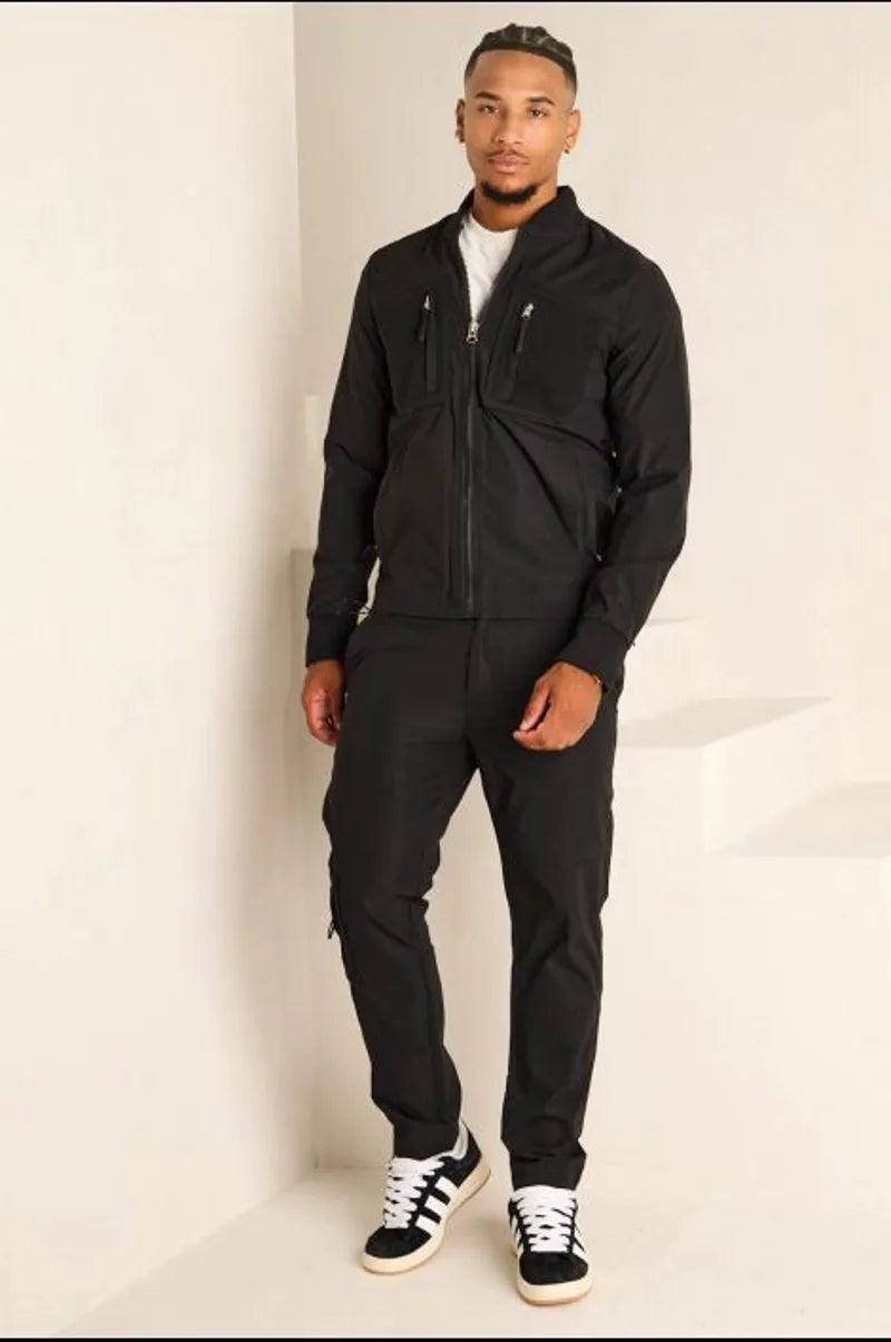 Two-piece ensemble: satin black bomber jacket and jogger pants.