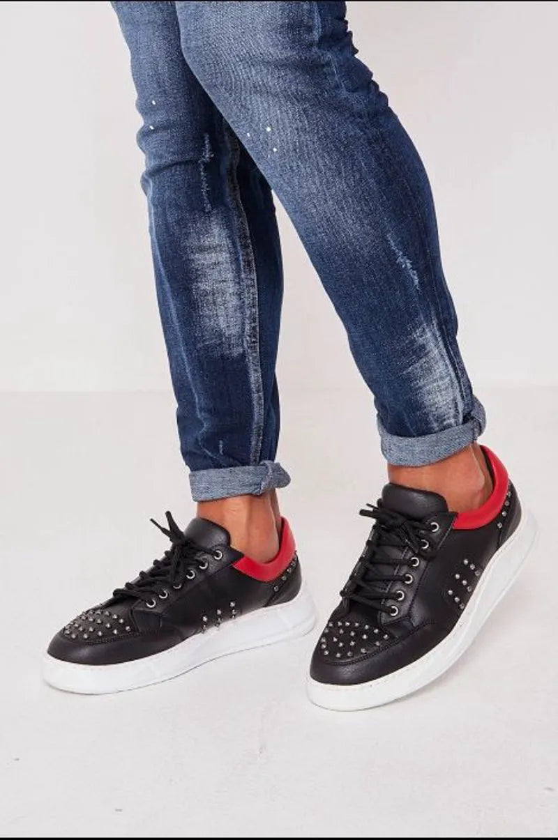 Studded black/red sneakers