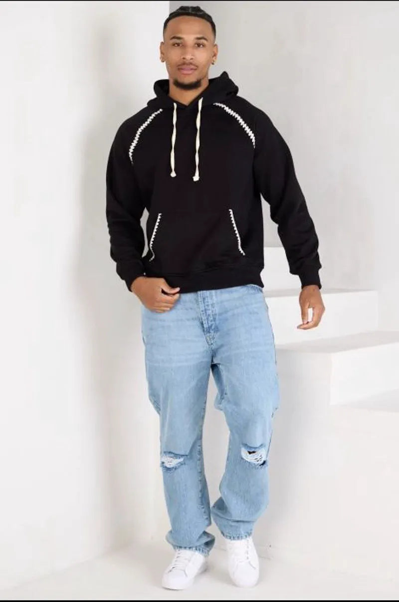 Black sweatshirt with two-tone details and kangaroo pocket.
