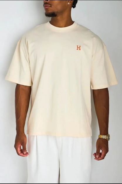 T-shirt beige à broderie '' H "