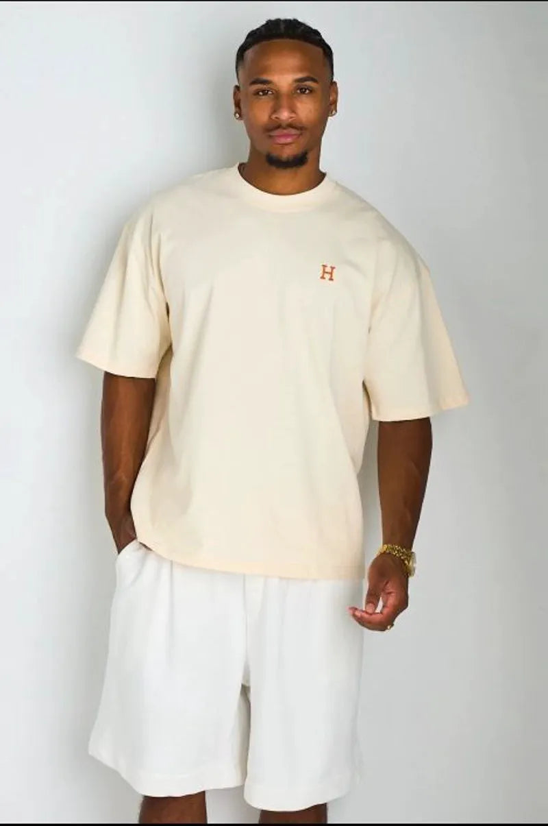 T-shirt beige à broderie '' H "
