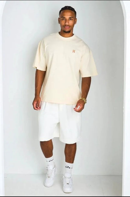 T-shirt beige à broderie '' H "