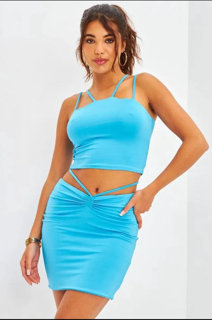 Two-piece ensemble: cropped top + blue drawstring skirt