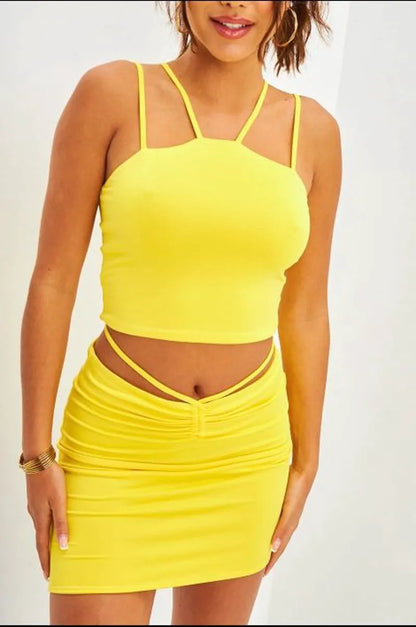Two-piece ensemble: yellow drawstring skirt and crop top