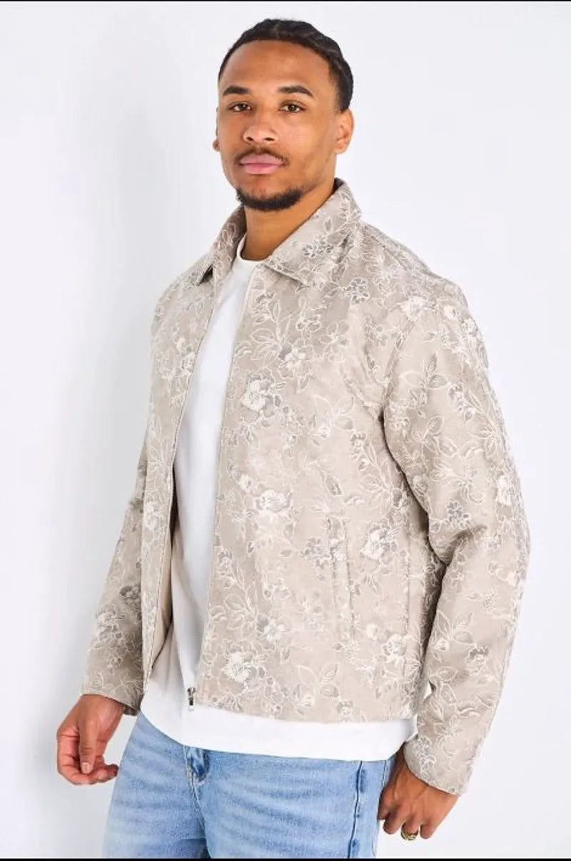 Veste beige à motifs floraux