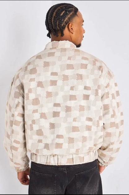 Veste beige style bomber à motifs géométriques carrés