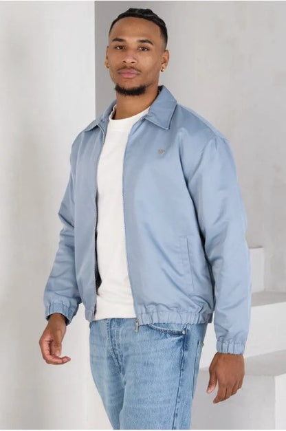 Blue zip-up jacket with heart on the chest