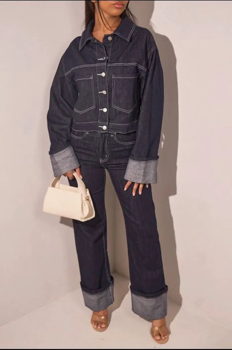 Dark blue cropped denim jacket with visible stitching