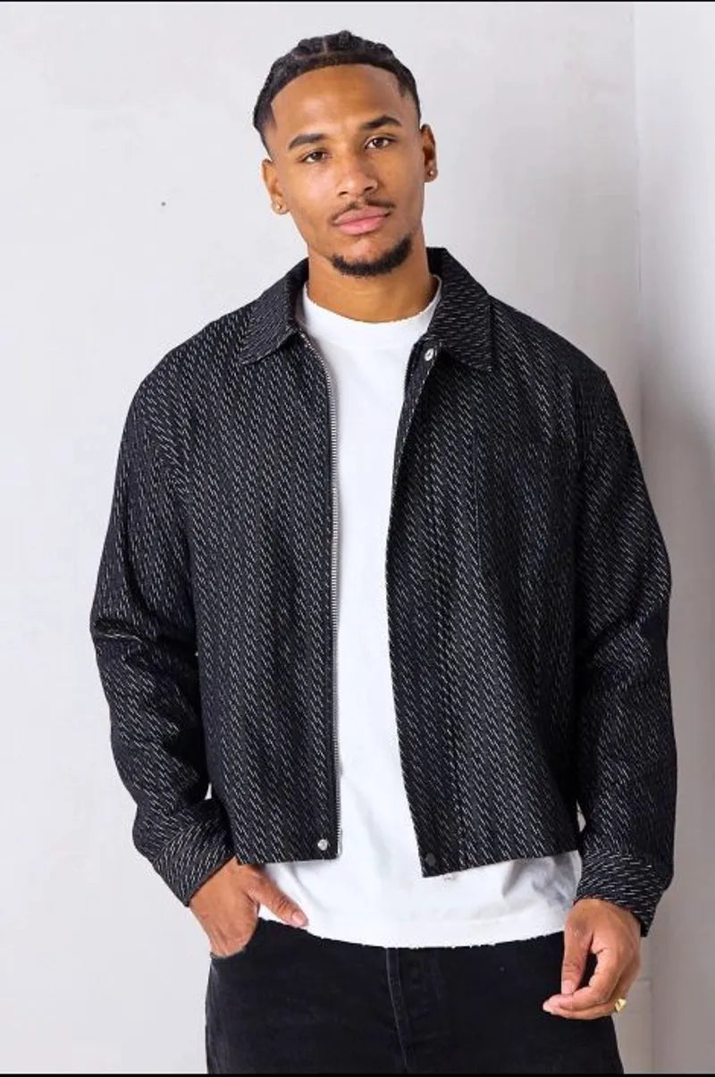 Black denim jacket with line pattern