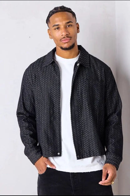 Black denim jacket with line pattern