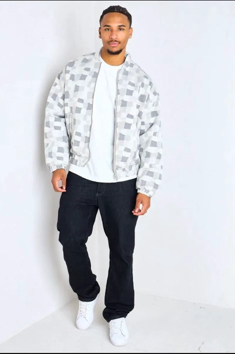 Gray bomber-style jacket with square geometric patterns