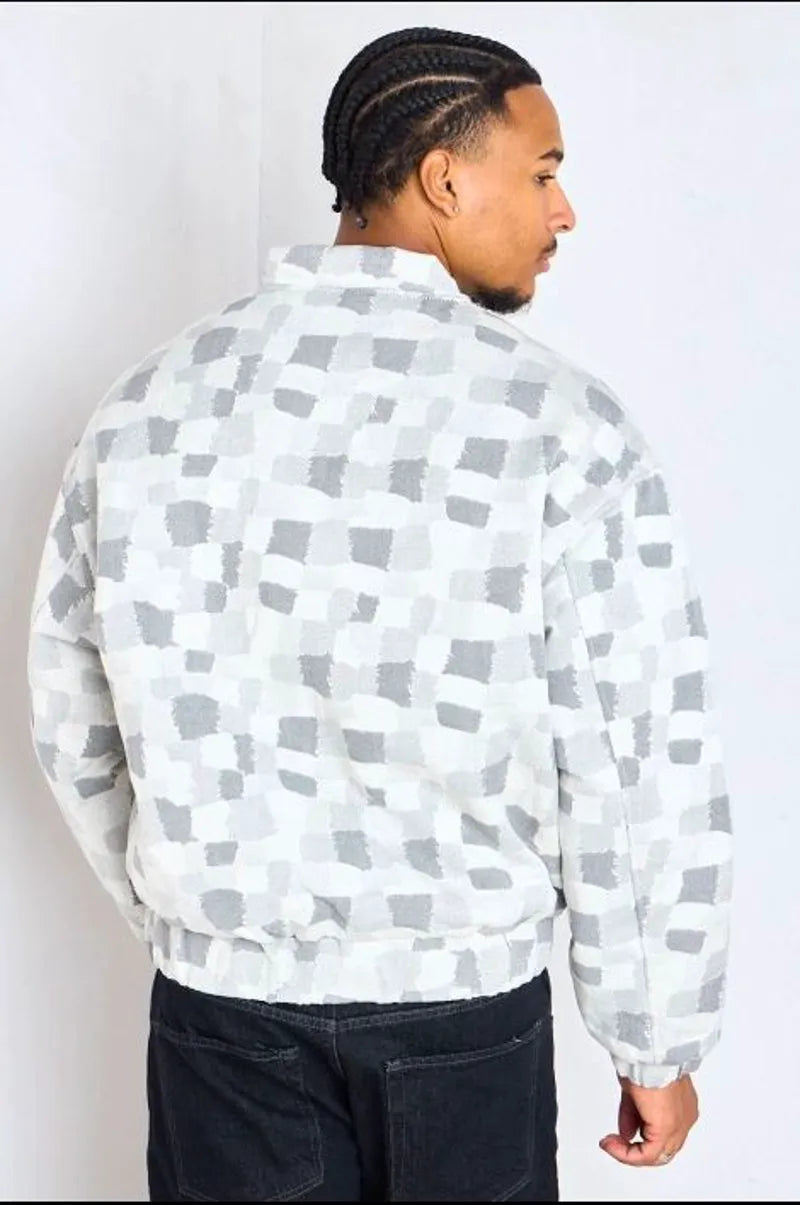 Gray bomber-style jacket with square geometric patterns