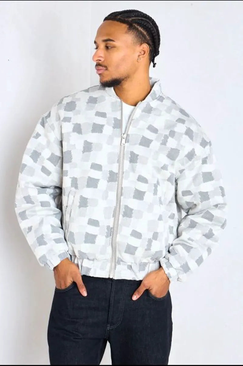 Gray bomber-style jacket with square geometric patterns