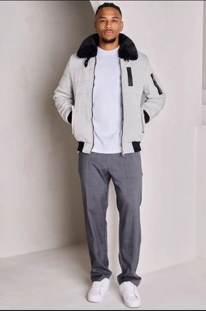 Quilted grey jacket with a fur collar