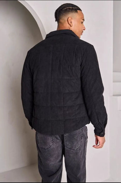Black quilted and ribbed jacket