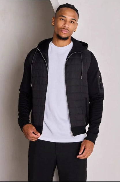 Black quilted dual-fabric hooded jacket