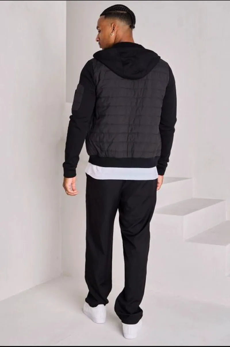 Black quilted dual-fabric hooded jacket
