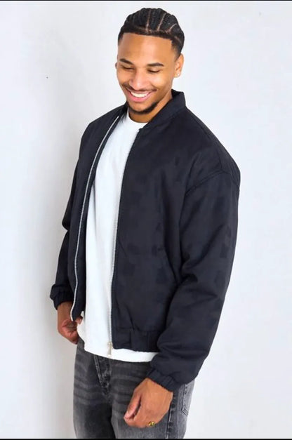 Black bomber-style jacket with square geometric patterns