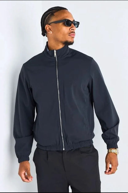 Veste réversible bleu marine à intérieur gris foncé