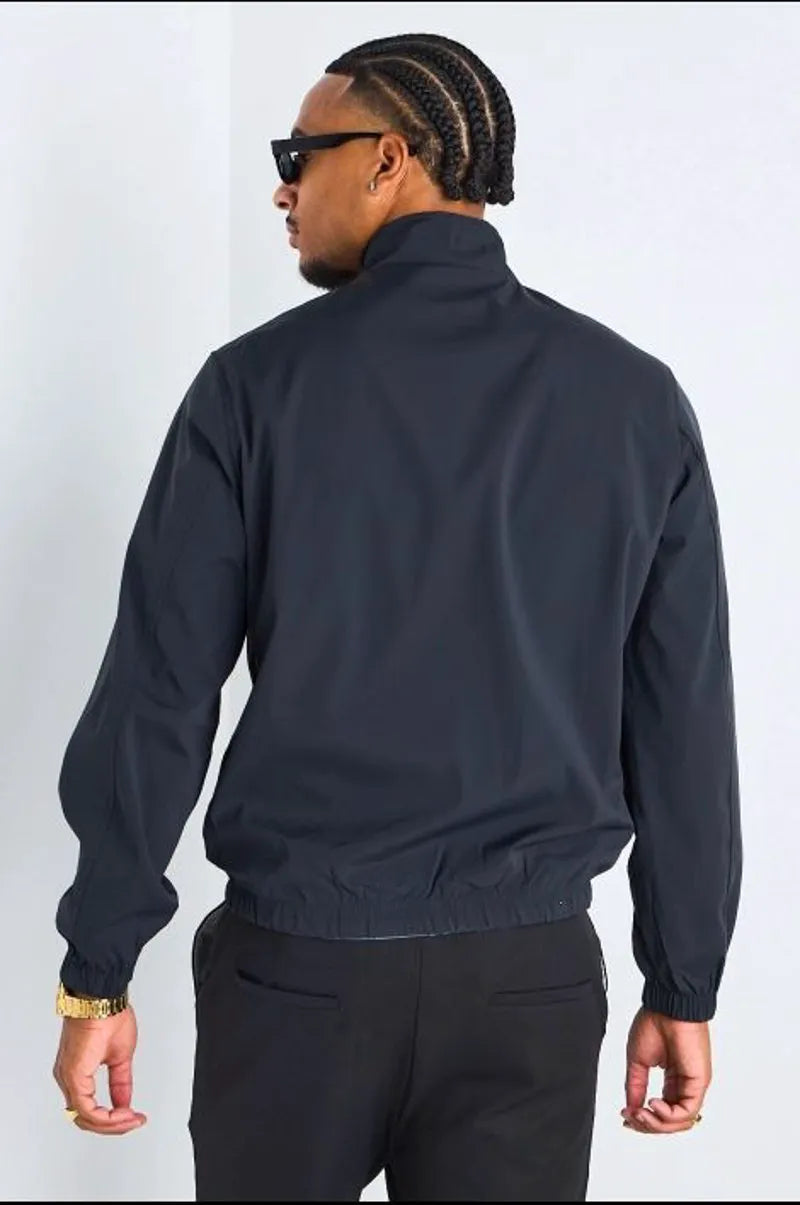 Veste réversible bleu marine à intérieur gris foncé
