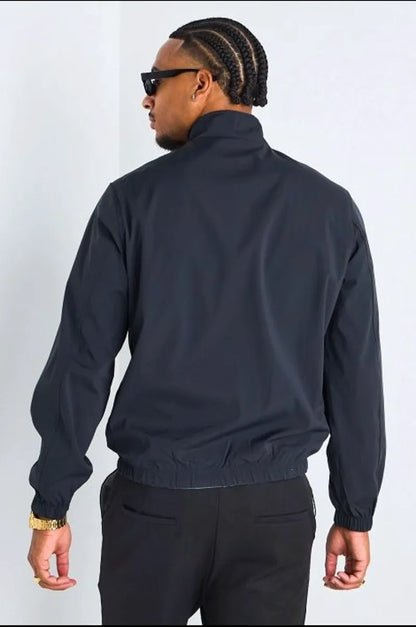 Veste réversible bleu marine à intérieur gris foncé